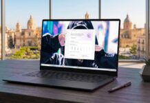 Recensione NordVPN 2026: laptop con dashboard Threat Protection e minacce bloccate in tempo reale